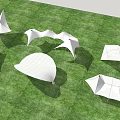 Modern Tensile Membrane Structures In Various Shapes On Green Grass Field