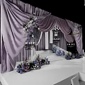 Elegant Banquet Hall With Purple Drapery Floral Decor Stage Steps And Chandeliers