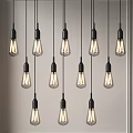 Vintage Pendant Lights With Black Sockets And Clear Filament Bulbs For Modern Interior Design