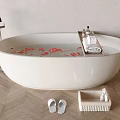 White Oval Bathtub With Rose Petals Bath Products Slippers And Storage Basket On Wooden Floor