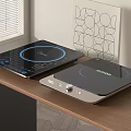 Modern Induction Cooktops On Wooden Table With Window And Decorative Art