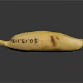 Yellow Bear Shaped Decorative Object With Silver6 Text On Surface
