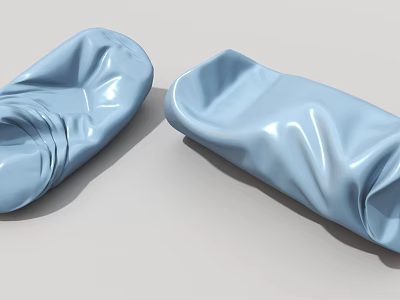 Two Blue Wrinkled Soft Packages Displaying Smooth Texture on Gray Background 3d model