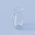 Transparent Glass Pitcher With Handle And Spout On Light Blue Background With Shadow