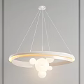 Chandelier With White Circular Frame And Spherical Bulbs Against Gray Wall With Yellow Light Effect