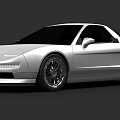 White Two Door Sports Car With Sleek Aerodynamic Design And Alloy Wheels