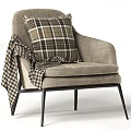 Modern Gray Armchair with Striped Pillow and Plaid Blanket on Black Metal Legs