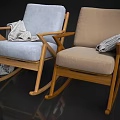 Light Blue And Beige Rocking Chairs With Wooden Frame Upholstered Seats And Gray Blankets Draped