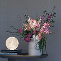 Decorative Ornament Set Featuring White Vase Pink White Flowers Moon Lamp And Books