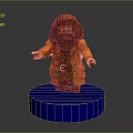 Toy Doll Figure with Brown Long Hair Beard and Orange Coat Standing on Blue Base