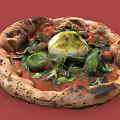 Delicious Homemade Pizza with Charred Crust Tomato Sauce Burrata Cheese Fresh Strawberries and Basil Leaves