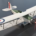 Vintage Biplane Fighter Model with Green Body Red Propeller and Wing Roundels