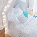 Kids Bed With House Headboard String Lights White Polka Dot Bedspread Blue Pillow ABC Blocks