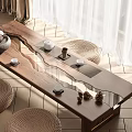 Natural Style Wooden Tea Table With Tea Set And Woven Cushions In Sunlit Indoor Space