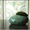 Grass Like Plants In Green Round Textured Vase For Modern Interior Decoration With Natural Light