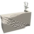 White Reception Desk With Textured Design And Small Plant On Top