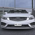 White Modern Sedan Car With Sleek Design Front Grille And Alloy Wheels