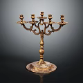 Antique Brass Candelabra With Ornate Design And Seven Candle Holders On Round Base