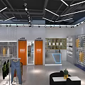Modern Clothing Store Interior With Displayed Clothes Orange Doors Checkout Counter And Display Racks