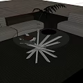 Modern Round Glass Coffee Table With Textured Top And Black Metal Legs In Living Room