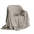 Soft Light Gray Blanket Draped Over Comfortable Chair With Cozy Texture