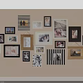Diverse Framed Photo Wall with Various Pictures Hanging on Beige Wall