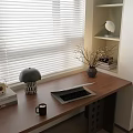 Modern Home Office Desk With Laptop Black Mug Table Lamp And Window Blinds