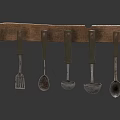 Metal Kitchen Utensils Hanging On Brown Wooden Rack Including Forks And Spoons
