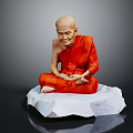 Elderly Man in Red Robe Sitting Cross-Legged on White Cushion Against Gray Background