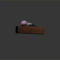 Sliced Purple Onion On Wooden Cutting Board With Black Handle Knife