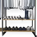 Organized Clothing Wardrobe With Hanging Shirts Jackets And Folded Clothes On Shelf
