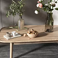 Modern Living Room Coffee Table With Green Plant Vases Flowers And Decorative Items