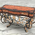 Elegant Vintage Console Table With Ornate Iron Legs And Gold Accents