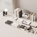 Books and Magazines Stacked in Various Sizes with Modern Arrangement and Decorative Items