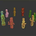 Scenic View Of Multiple Wooden Carvings Arranged On Dark Background
