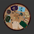 Vintage Round Wooden Table with Carved Legs and Items Like Open Box Candle Playing Cards