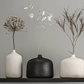 Minimalist Decorative Ornament Set With White And Black Vases Holding Dried Flowers And Branches