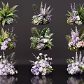 Elegant Floral Arrangement With Purple White Flowers Green Ferns And Succulents
