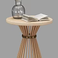 Wooden Round Side Table With Striped Legs Metal Ring Open Book And Transparent Vase