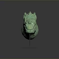 Detailed Green Dragon Head Sculpture With Textured Surface On Gray Stand