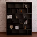 Stylish Black Bookshelf With Books Decorative Vases Photo Frame And Ornaments Against Brick Wall Background