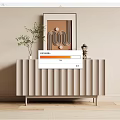 Modern Beige Fluted Entryway Console Cabinet With Green Plant Small Figurine And Wall Art