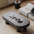 Modern Oval Coffee Table In Living Room With Magazine Bowl And Sofa