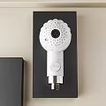 Modern White Shower Head Featuring Circular Spray Nozzles And Central Black Panel 3d model