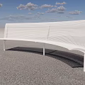 White Modern Public Bench With Perforated Striped Design Under Cloudy Sky On Gray Gravel Ground