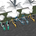 Colorful Bicycles Parked On Brick Paved Ground With Green Grass And Palm Trees