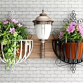 Creative Garden Decor with Hanging Planters Metal Brackets and Colorful Plants on Brick Wall
