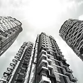 Modern High Rise Residential Building With Unique Tower Design And Urban Facade