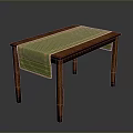 Stylish Wooden Dining Table With Green Patterned Tablecloth And Classic Leg Design