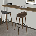 Stylish Black And Brown Bar Stools With Wooden Legs And Kitchen Countertop